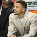 Steph Curry squinting court-side