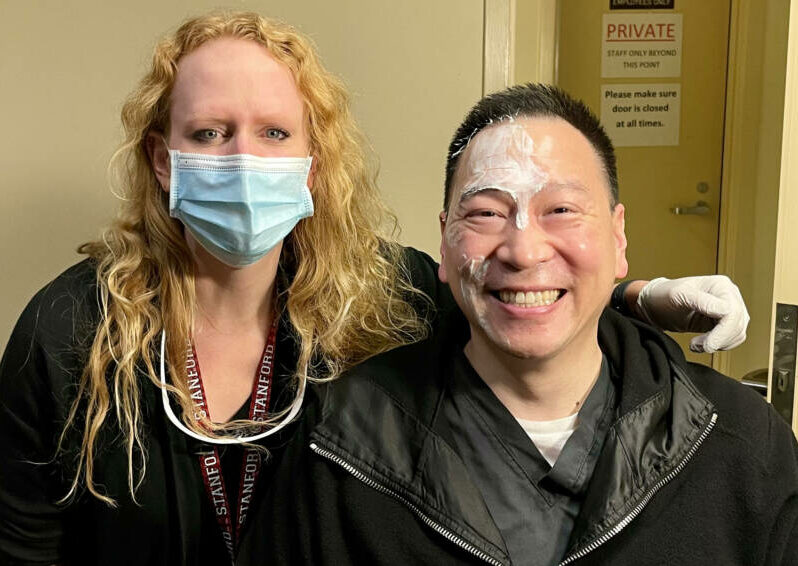 Dr. Emily Charlson and Dr. Scott So pose for a photo